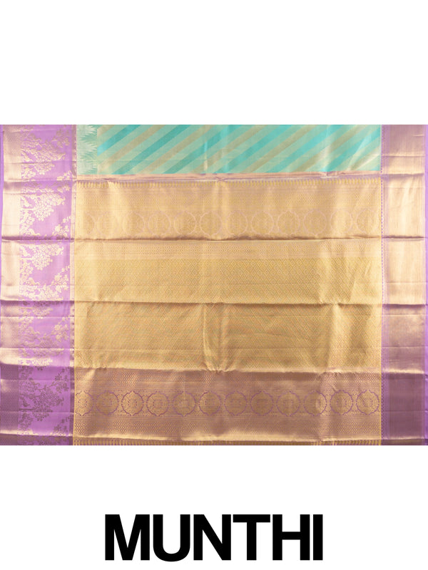 Turquoise green pure Kanchipuram silk saree with diagonal gold zari stripes and contrast lavender zari border