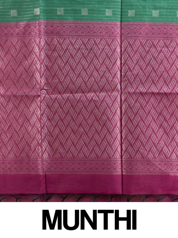 Bottle green silk cotton saree with silver zari stripes and contrast magenta border and pallu