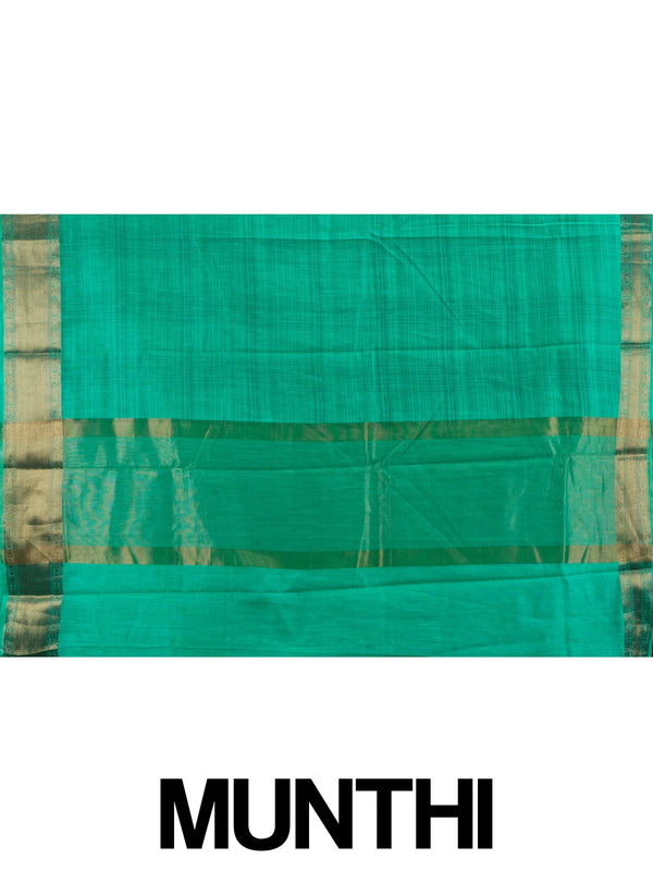 Green semi tussar saree with gold zari border and matching green butta blouse