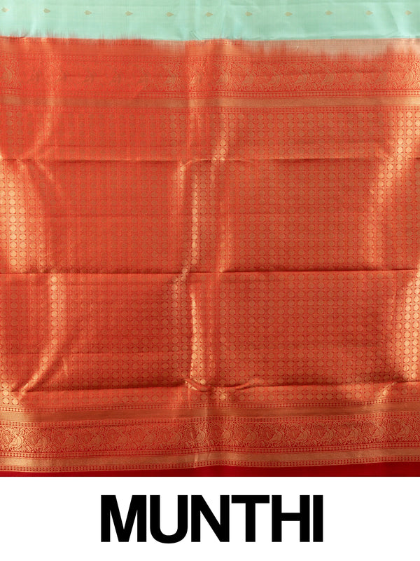 Sea green pure Kanchipuram silk saree with contrast red border, gold zari peacock motifs and richly woven pallu