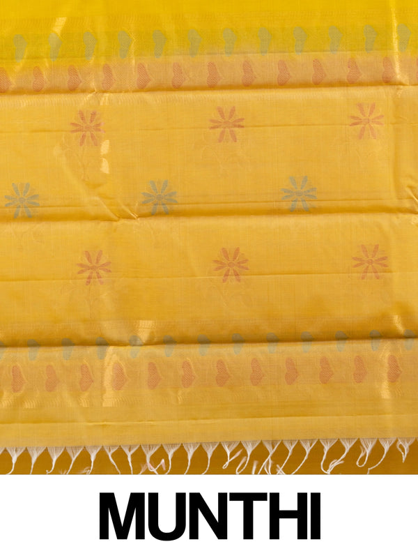 Bright yellow pure silk cotton saree with floral buta motifs and gold zari border