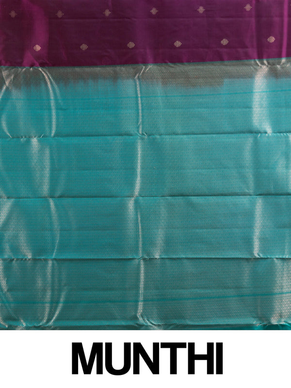 Purple pure Kanchipuram silk saree with teal contrast border and silver zari buti motifs