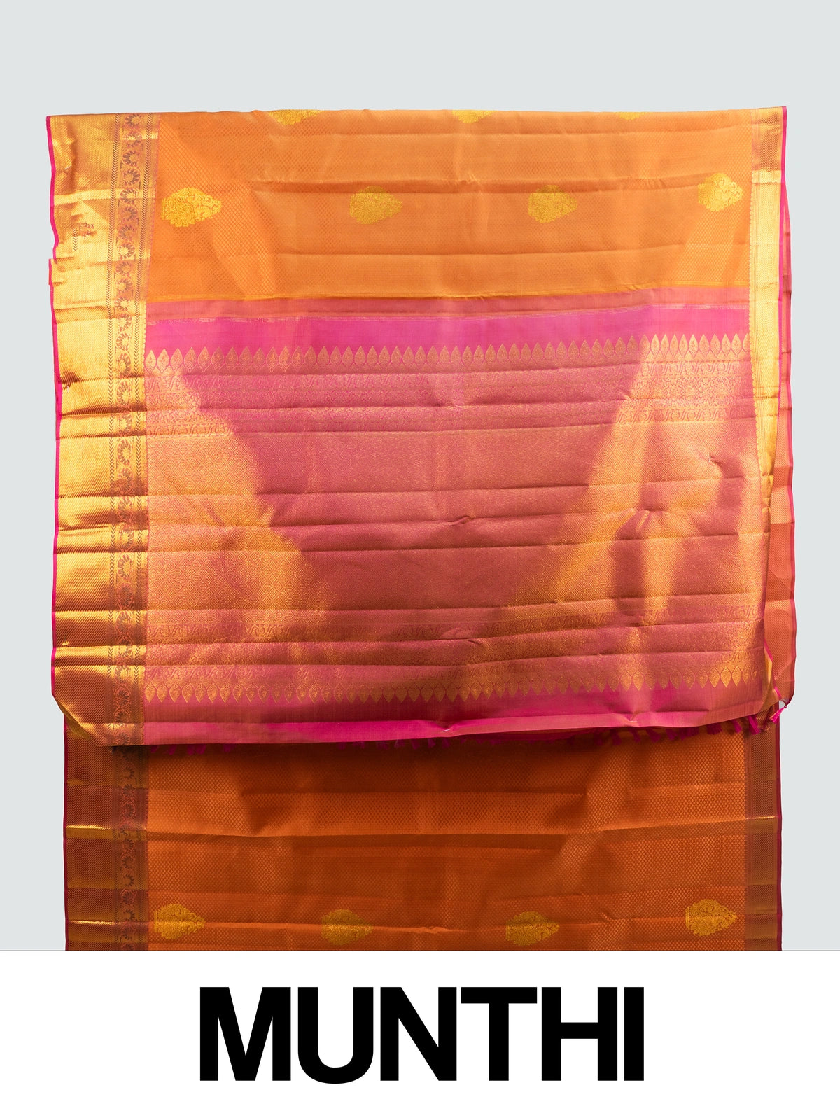 Rust orange pure Kanchipuram silk saree with pink and gold zari contrast border and woven pallu