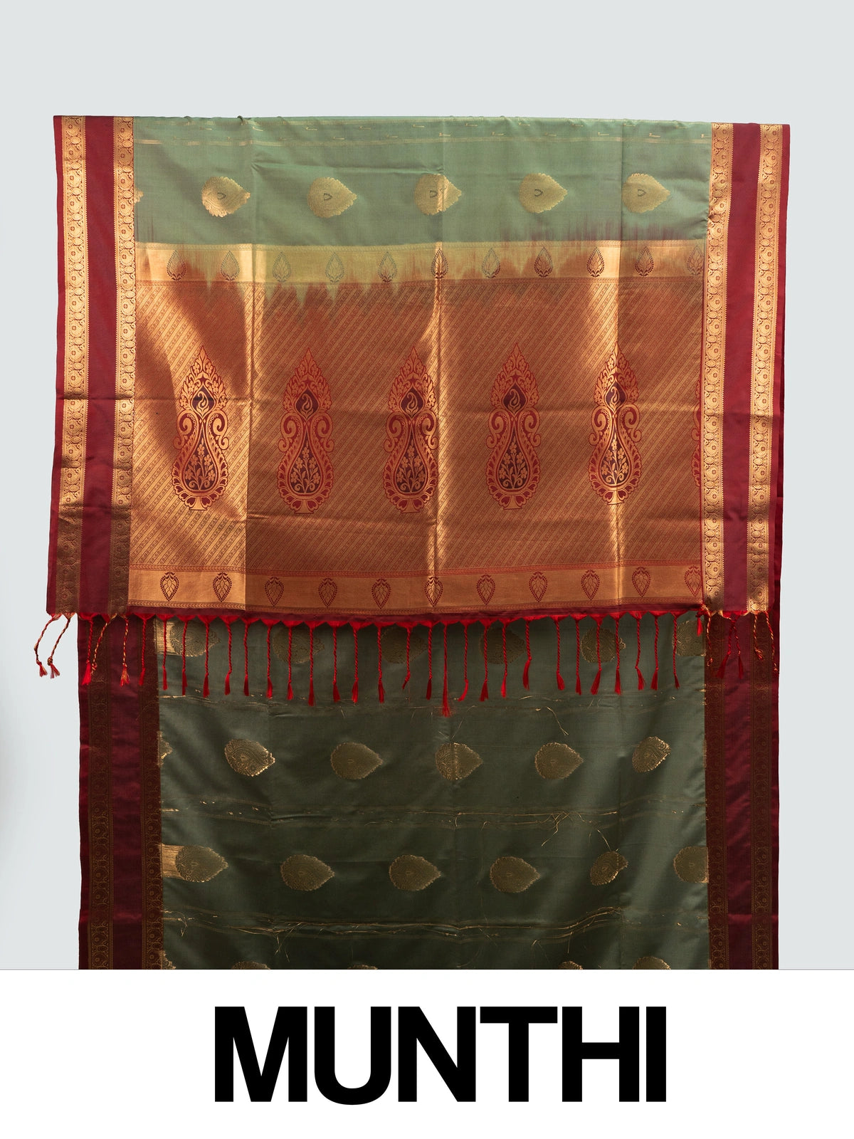 Olive green Kanchipuram fancy silk saree with contrast maroon and gold zari border and paisley pallu