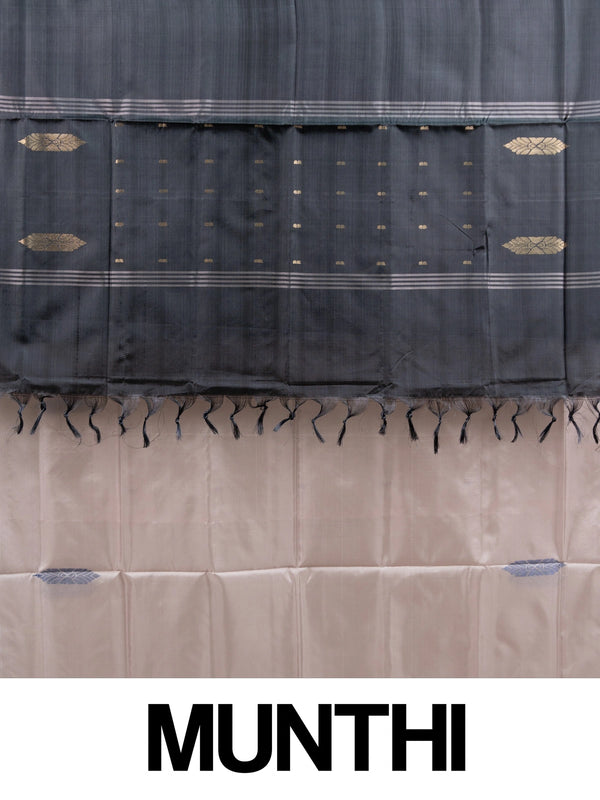 Blush beige Banana Silk saree with charcoal grey contrast pallu, gold zari leaf motifs and blue butta work