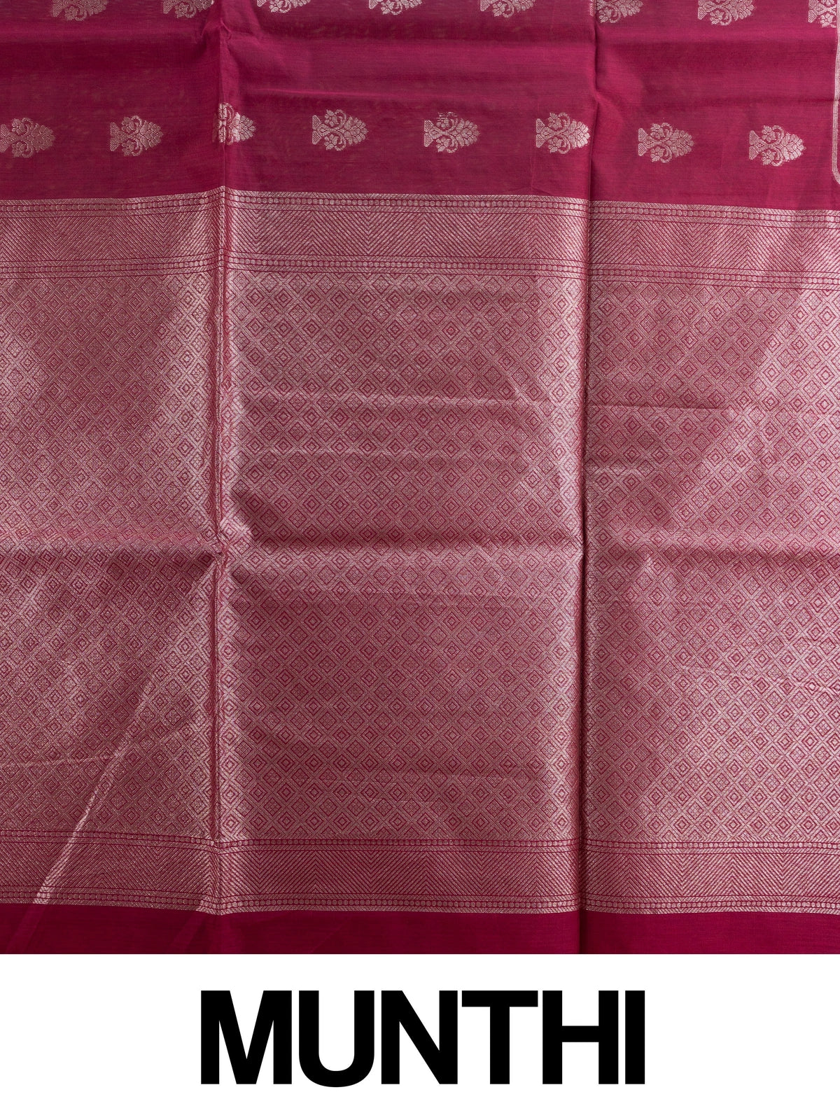 Magenta silk cotton saree with silver zari floral buttis and woven border