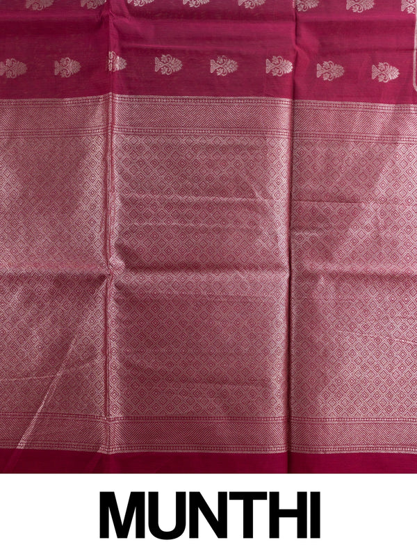 Magenta silk cotton saree with silver zari floral buttis and woven border