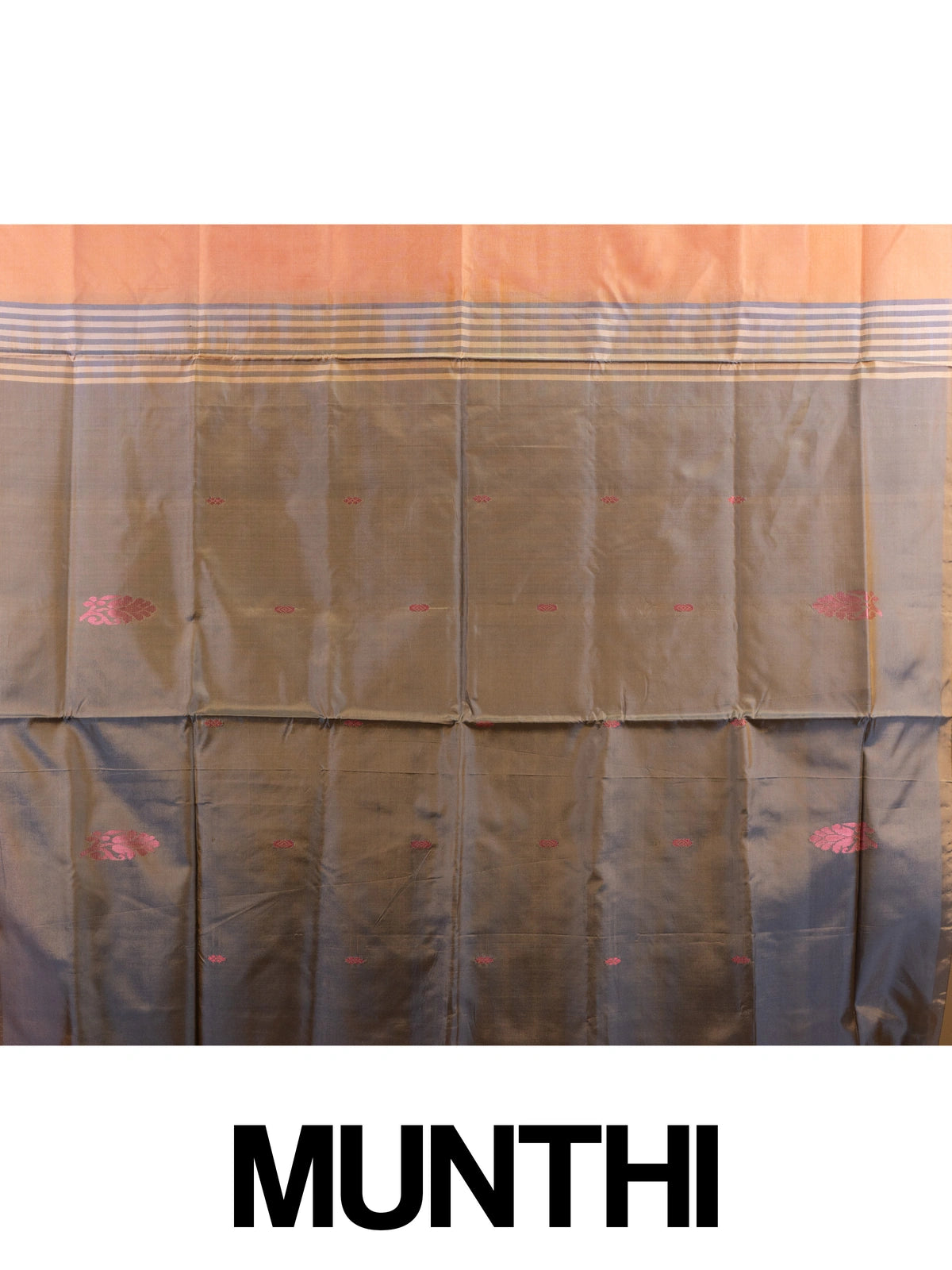 Peach orange banana silk saree with silver buttas and a contrast grey striped pallu