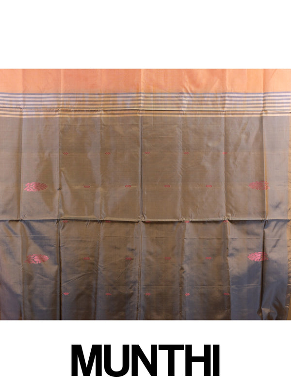 Peach orange banana silk saree with silver buttas and a contrast grey striped pallu