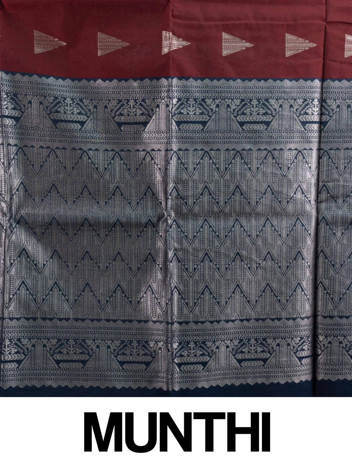 Maroon silk cotton saree with silver zari triangular motifs and contrast navy blue zari border and pallu