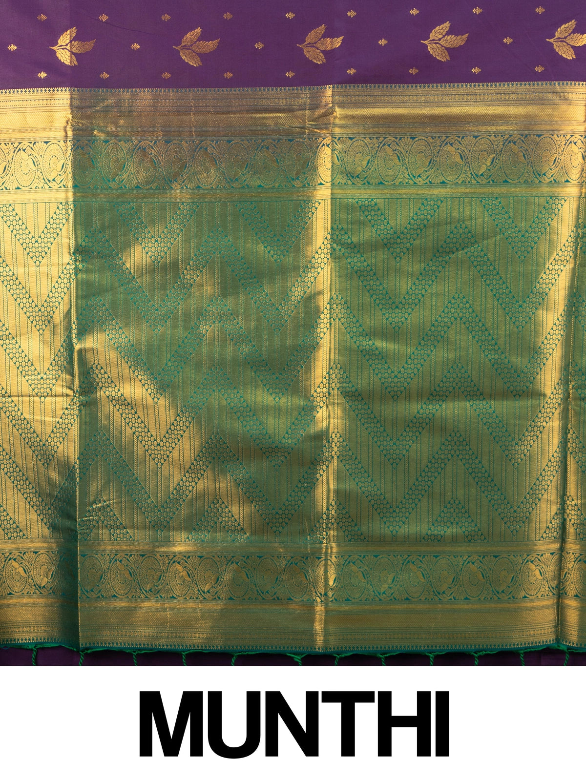 Purple semi silk saree with gold zari butta, contrast green zari border and ornate green-gold pallu