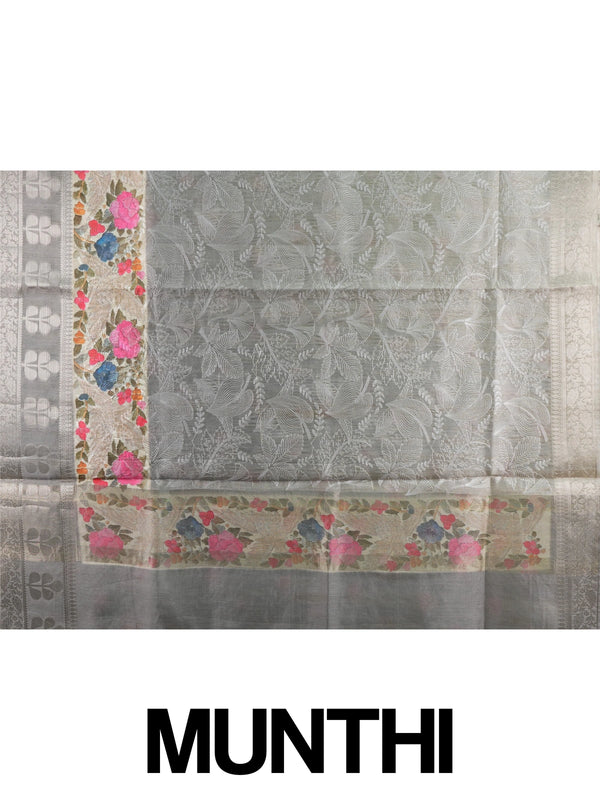 Grey designer saree with white floral embroidery, silver zari border and multicoloured embroidered roses