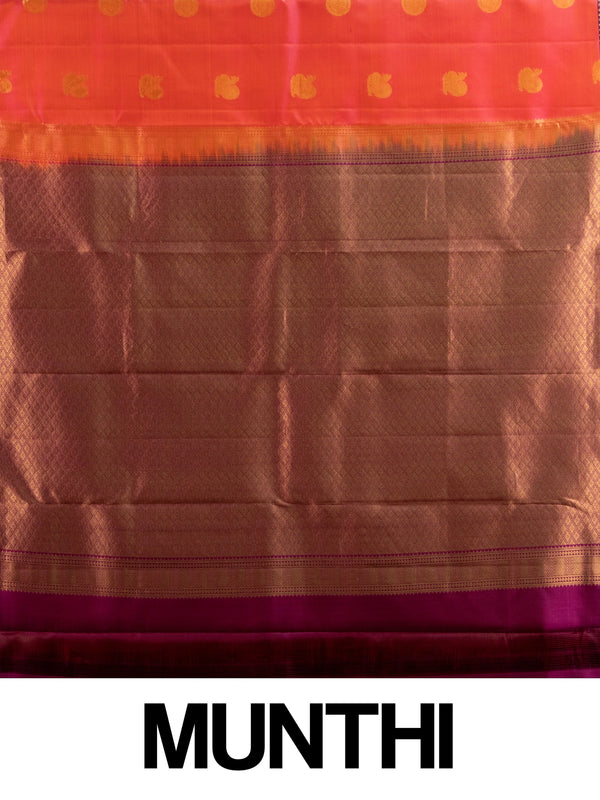 Orange-red pure Kanchipuram silk saree with gold zari buttas and contrast purple zari border and pallu