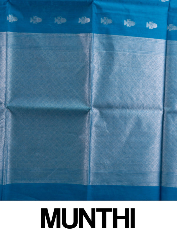 Peacock blue silk cotton saree with silver zari floral buttas and diamond-patterned border