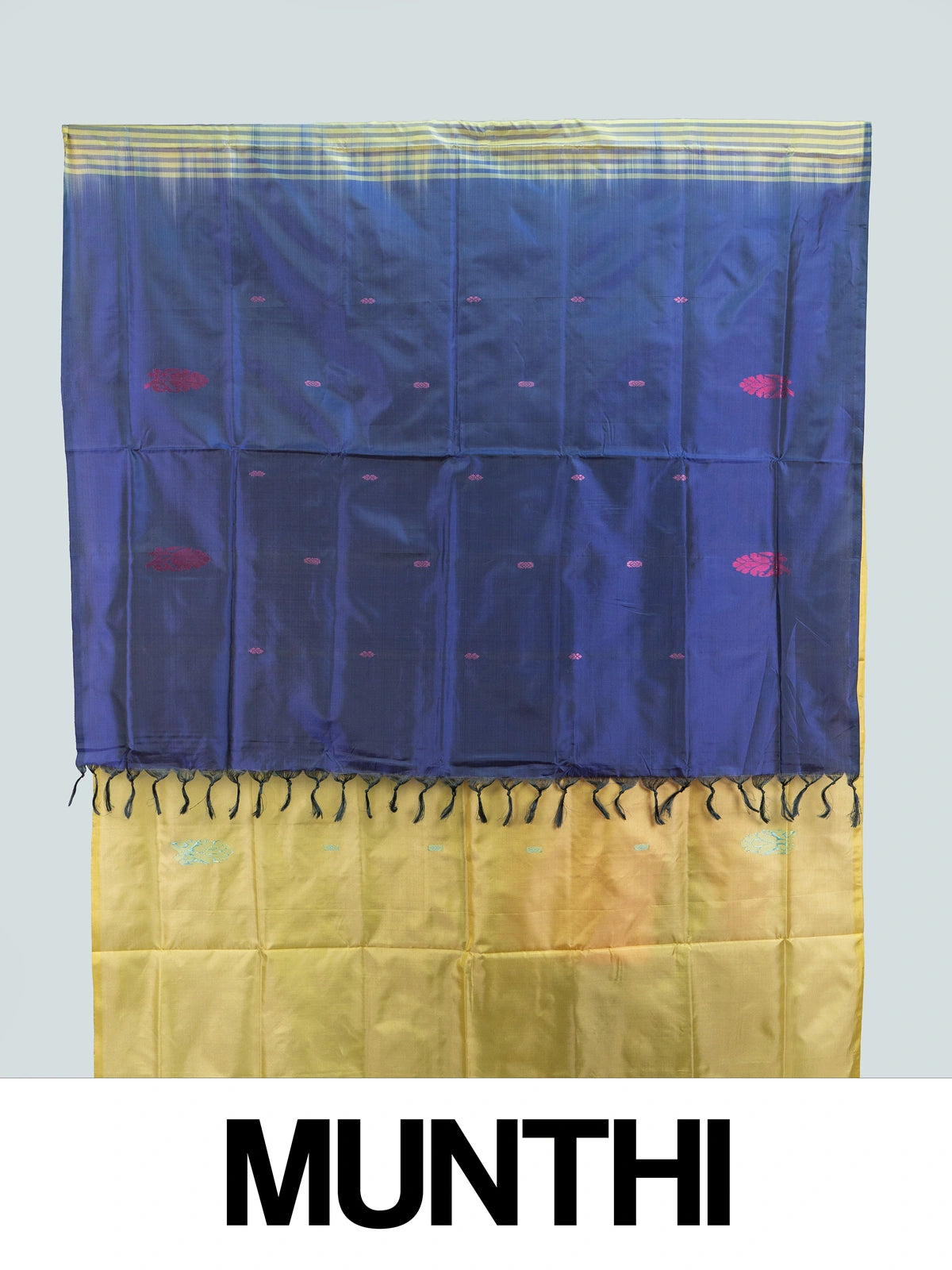 Yellow banana silk saree with navy blue contrast pallu, turquoise buttas and gold zari striped border
