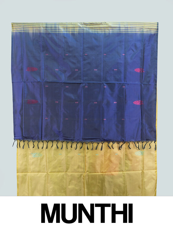 Yellow banana silk saree with navy blue contrast pallu, turquoise buttas and gold zari striped border