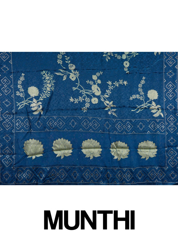 Navy blue and gold designer saree with floral lotus motifs and geometric border