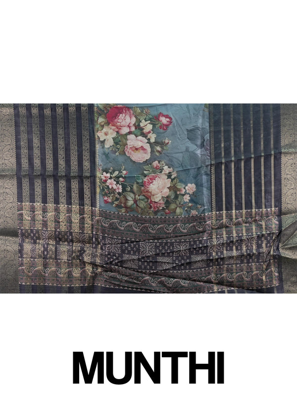 Charcoal grey semi tussar saree with gold zari stripes, floral prints, and a woven gold border