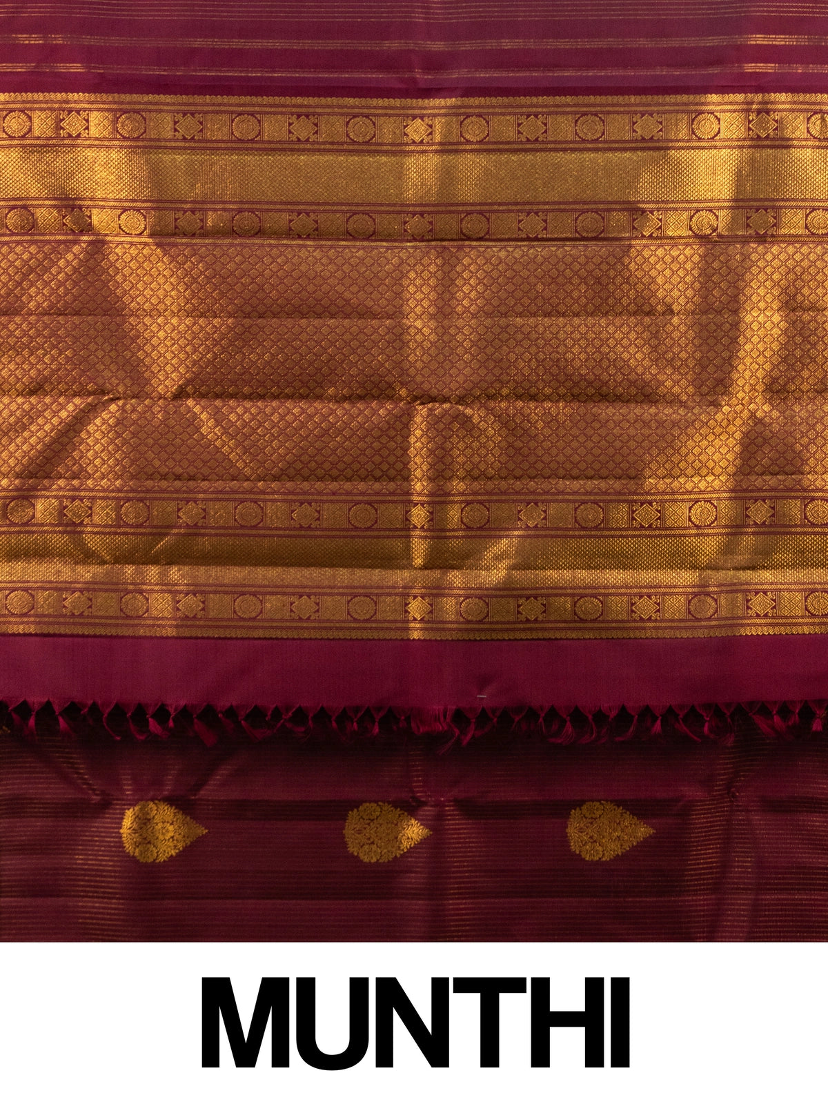 Maroon pure Kanchipuram silk saree with gold zari border, buttas and ornate woven pallu