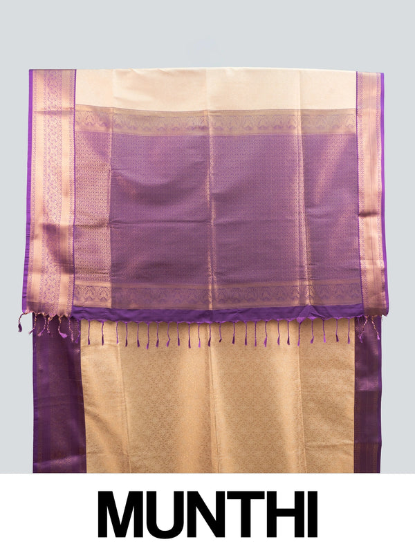 Beige Kanchipuram Fancy Silk saree with contrast purple and gold zari border and pallu
