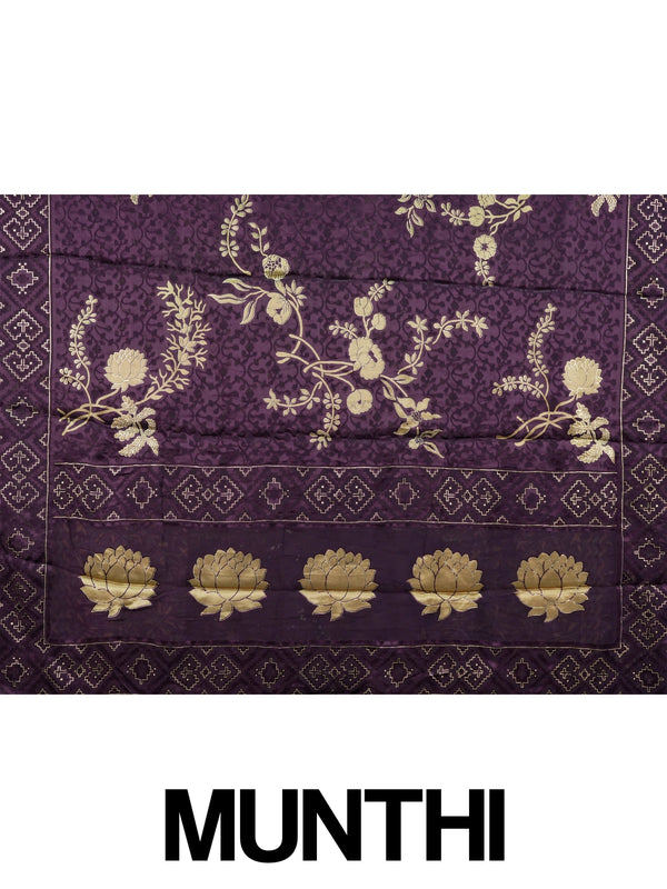 Purple and gold designer art silk saree with floral zari motifs, lotus pallu and contrast printed blouse