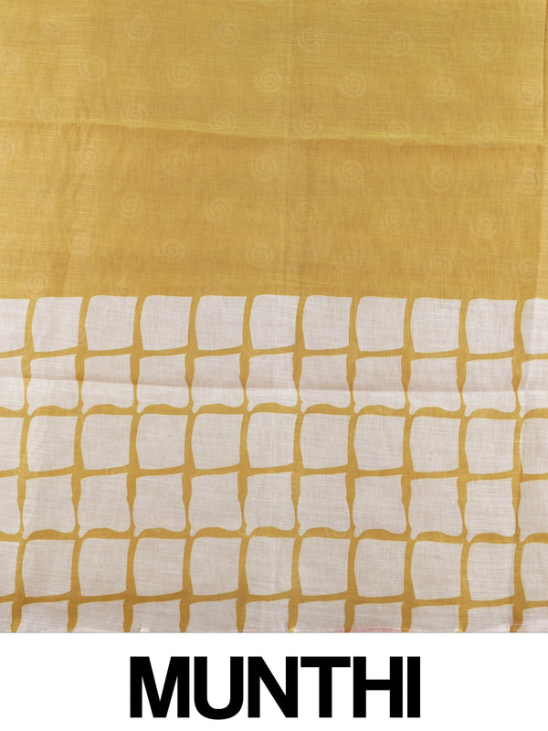 Mustard and white batik print linen cotton saree with contrast tile border and spiral motifs