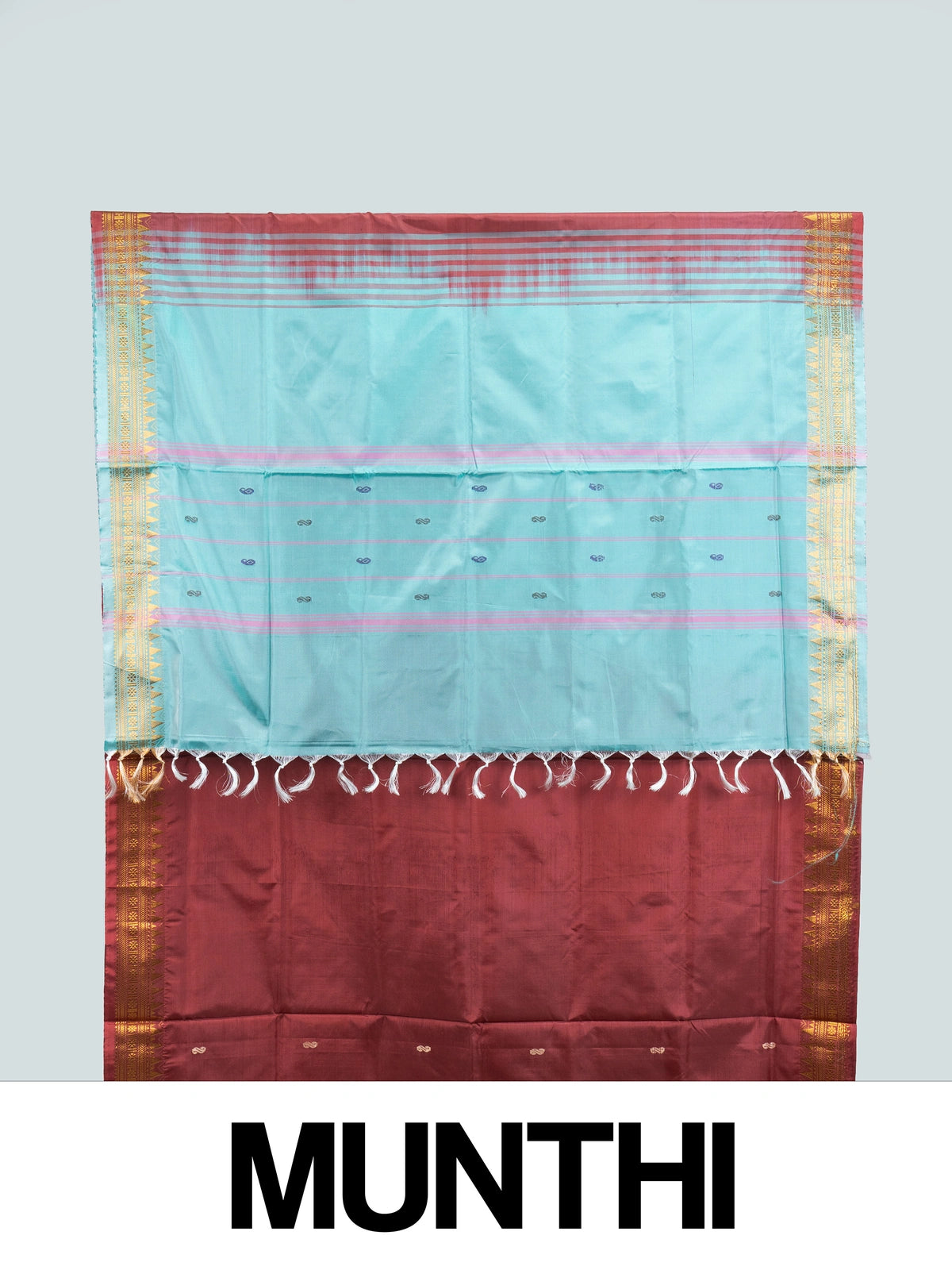 Maroon Banana Silk saree with turquoise contrast pallu and gold zari temple border