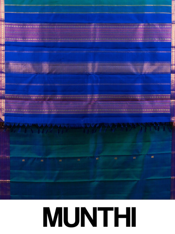 Peacock teal pure Kanchipuram silk saree with contrast royal blue gold zari border and woven pallu