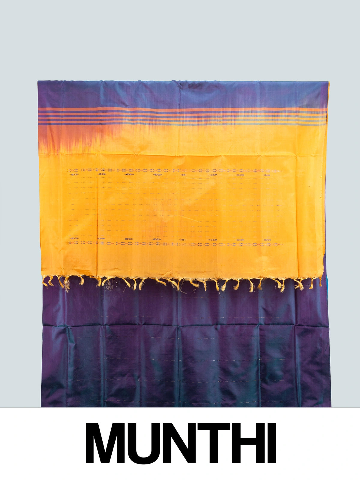 Teal and purple banana silk saree with gold zari stripes and a contrast mustard striped pallu
