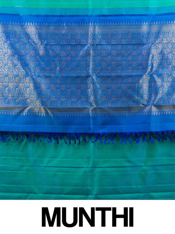 Teal green pure Kanchipuram silk saree with contrast blue and gold zari border and floral zari pallu