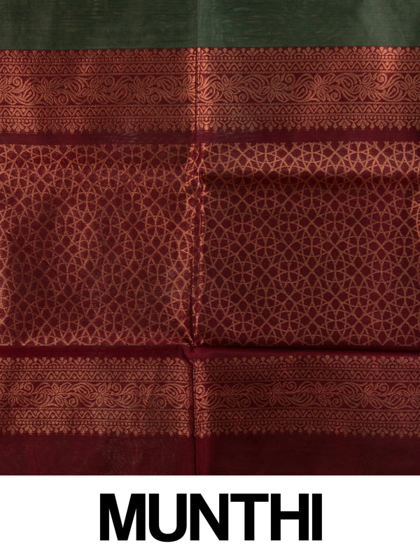Dark green silk cotton saree with copper zari buttas and contrast maroon border and pallu