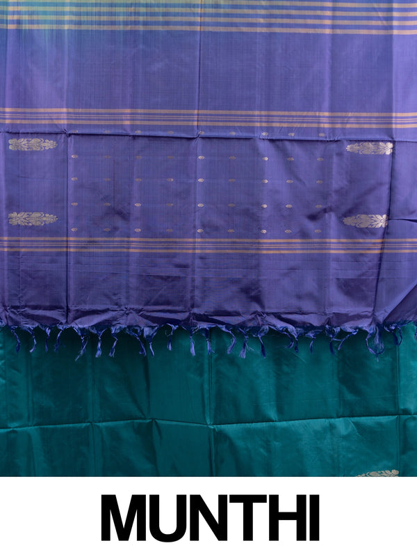 Teal blue banana silk saree with contrast purple pallu and gold zari border