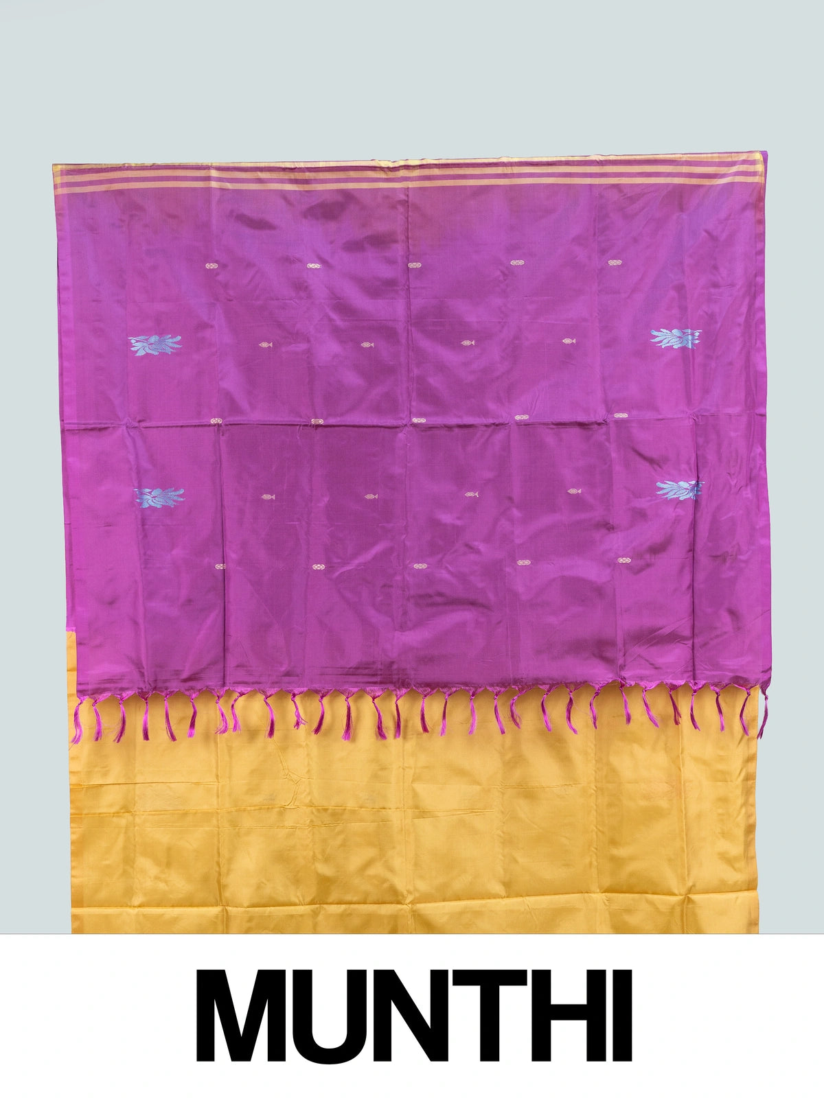 Mustard yellow banana silk saree with contrast magenta pallu, gold zari striped border and woven floral buttas