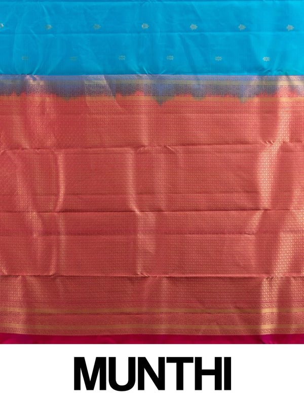 Peacock blue pure Kanchipuram silk saree with contrast pink and gold zari border and pallu