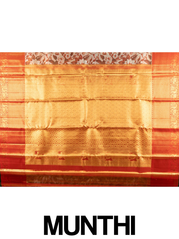 Cream and orange pure Kanchipuram silk saree with floral printed body and gold zari contrast border
