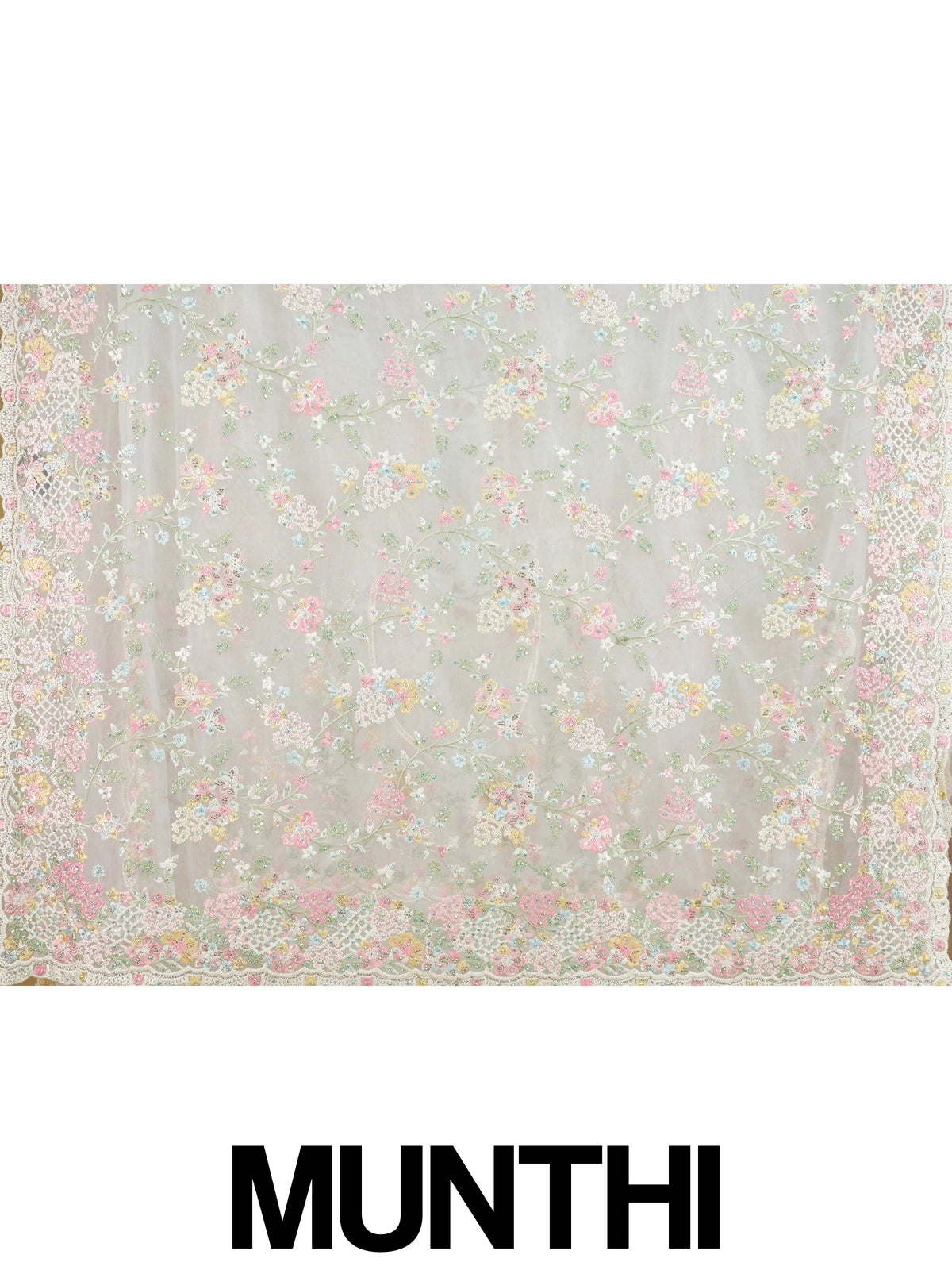 Cream net designer saree with pastel multicolour floral embroidery and scalloped border