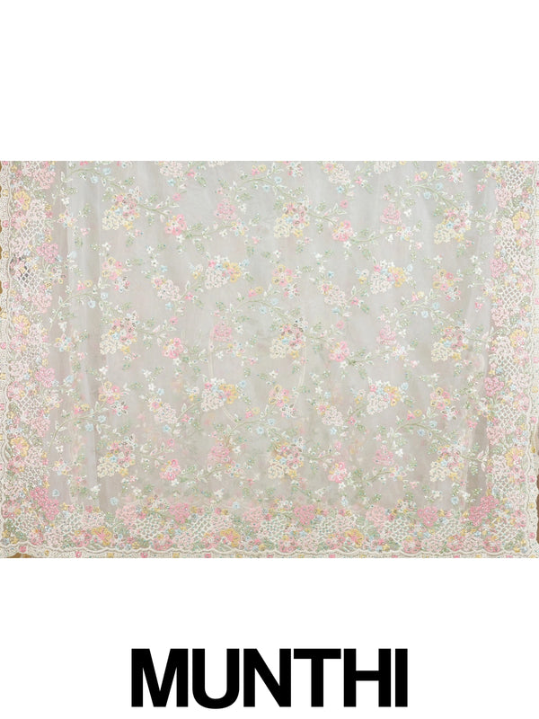 Cream net designer saree with pastel multicolour floral embroidery and scalloped border