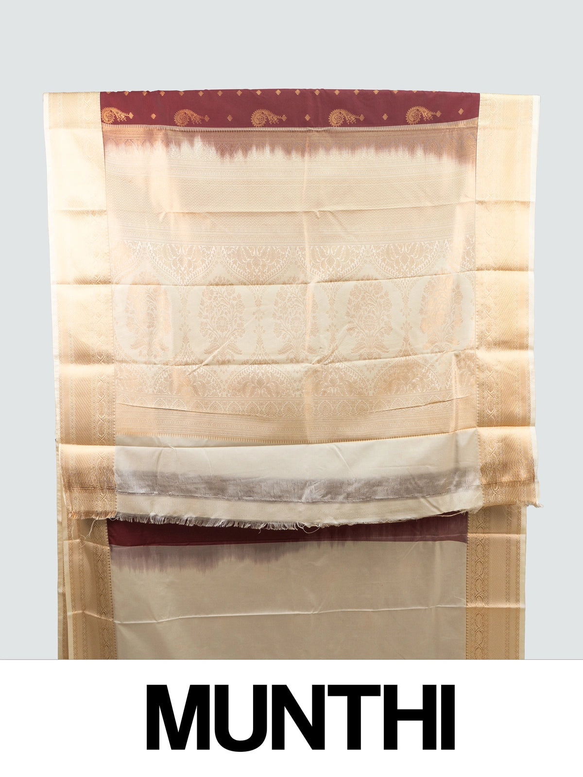Maroon and cream semi silk saree with gold zari paisley motifs and contrast cream floral zari border
