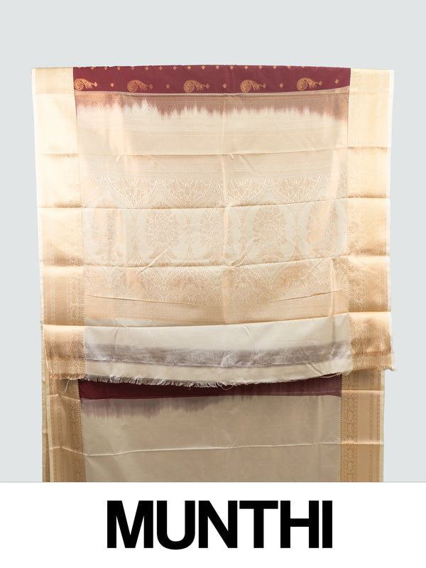Maroon and cream semi silk saree with gold zari paisley motifs and contrast cream floral zari border