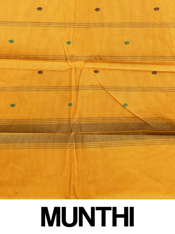Mustard yellow Chettinad cotton saree with green contrast border, gold zari peacock motifs and woven buttis