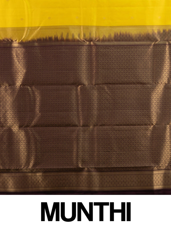Yellow pure Kanchipuram silk saree with contrast wine border and gold zari brocade pallu