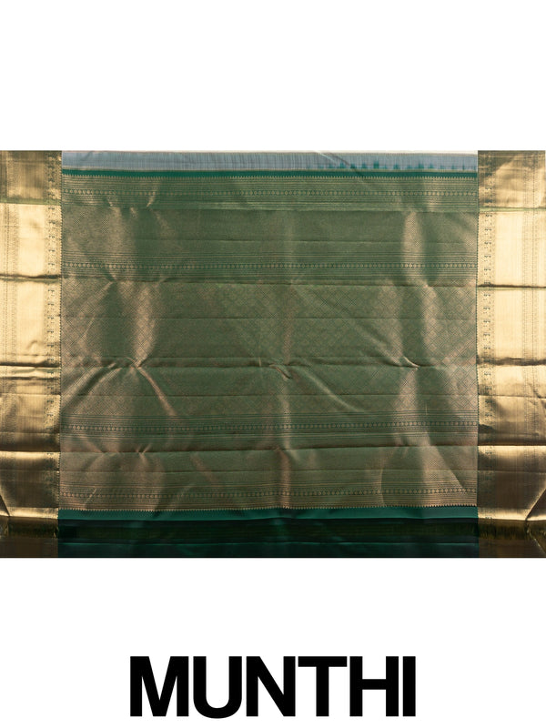 Cream pure Kanchipuram silk saree with gold zari brocade body and contrast dark green and gold border and pallu