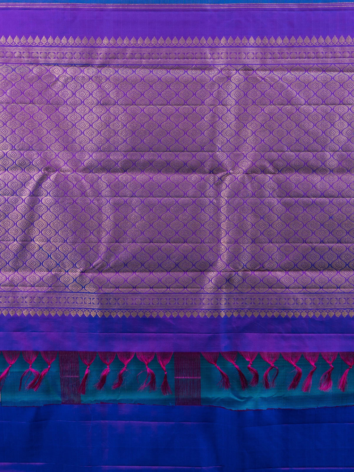 Peacock blue pure Kanchipuram silk saree with contrast purple gold zari border and brocade pallu