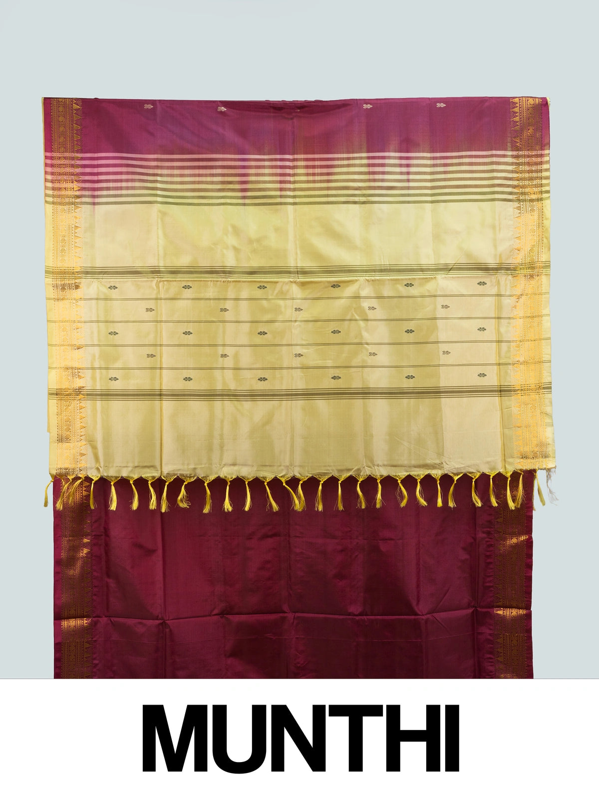 Maroon Banana silk saree with gold zari border, woven buta motifs and contrast cream pallu