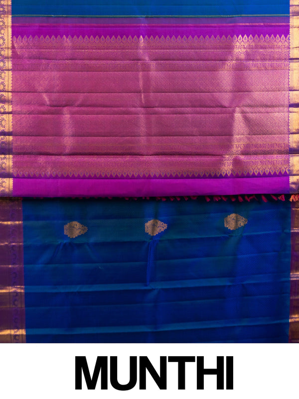 Royal blue Pure Kanchipuram silk saree with contrast magenta border, gold zari buttas and woven pallu